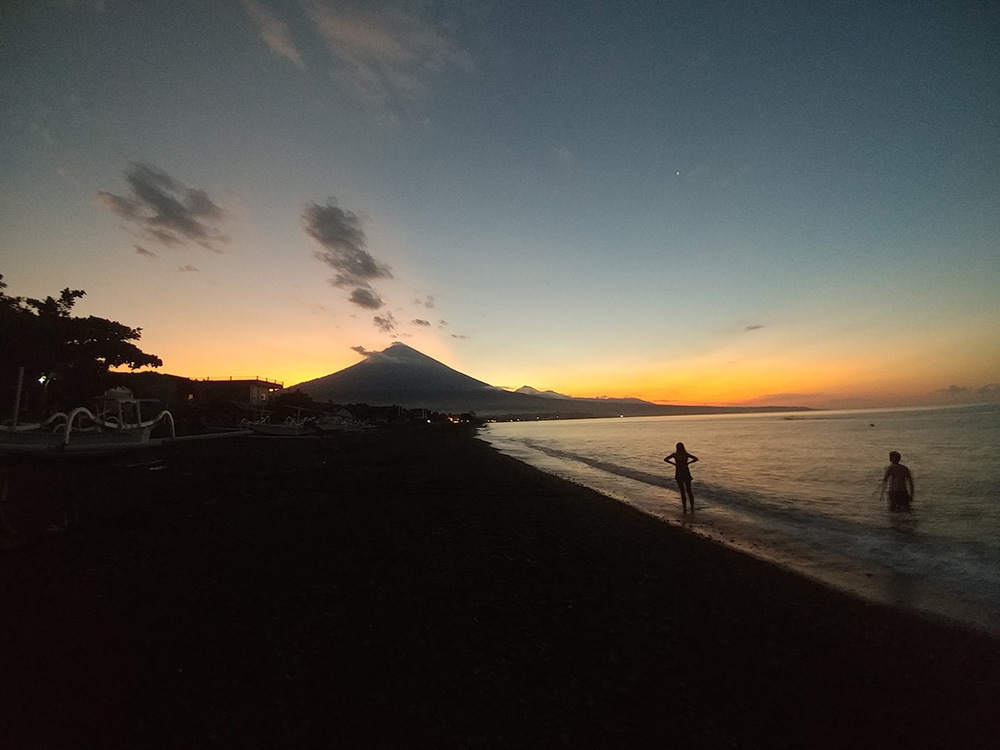 sunset swim with the view on Mount Agung